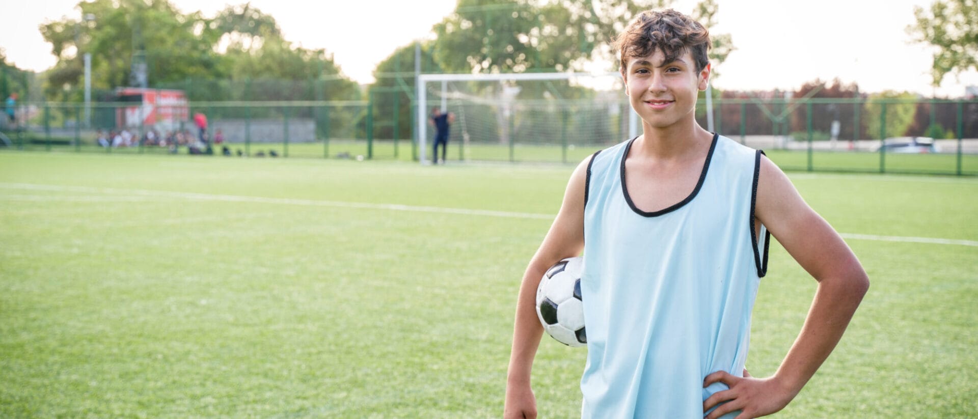 Boy holding a soccer ball