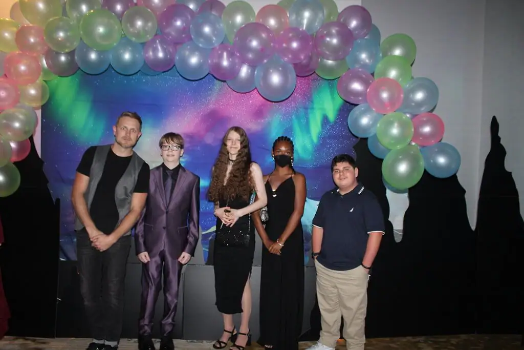 students smiling at the party event