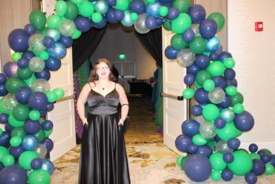 student girl in formal dress at prom