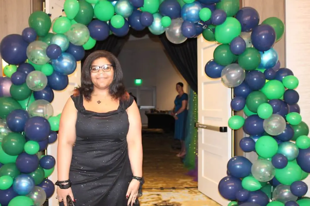 student girl in formal dress at prom