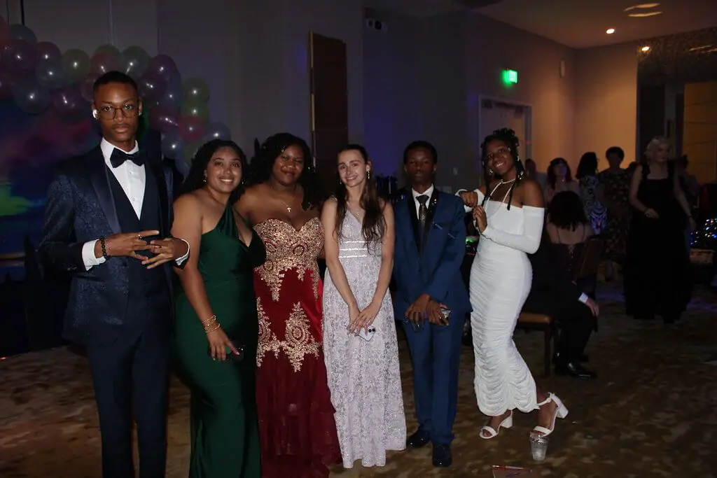 students at the prom smiling