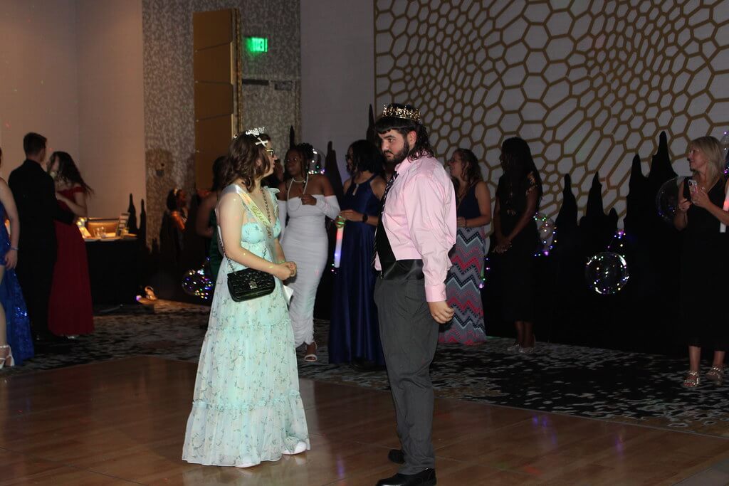 students talking at the prom