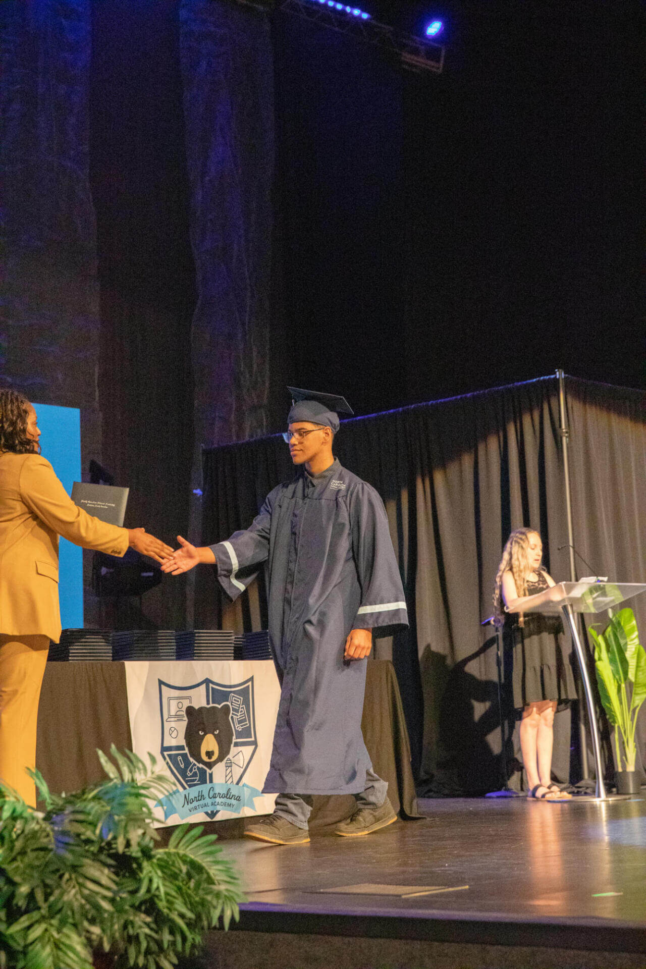 boy receiving a diploma