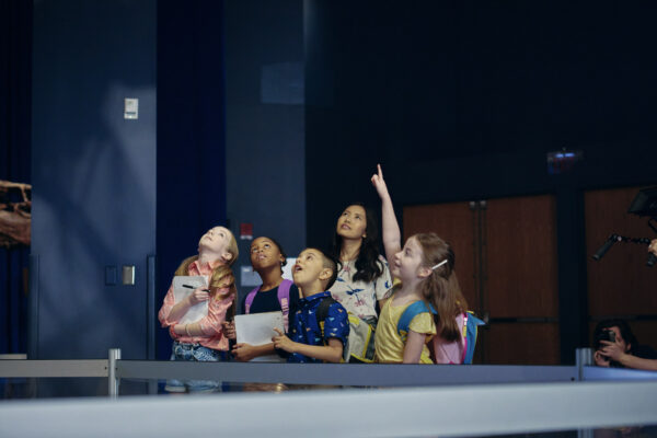 Girl raising her hand