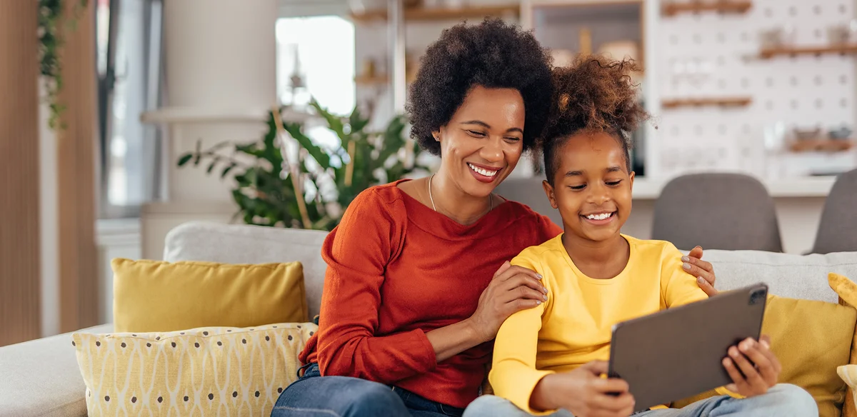 Mother and daughter with their tablet