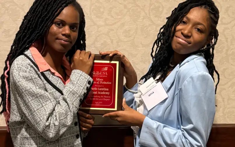 girl with friend smiling